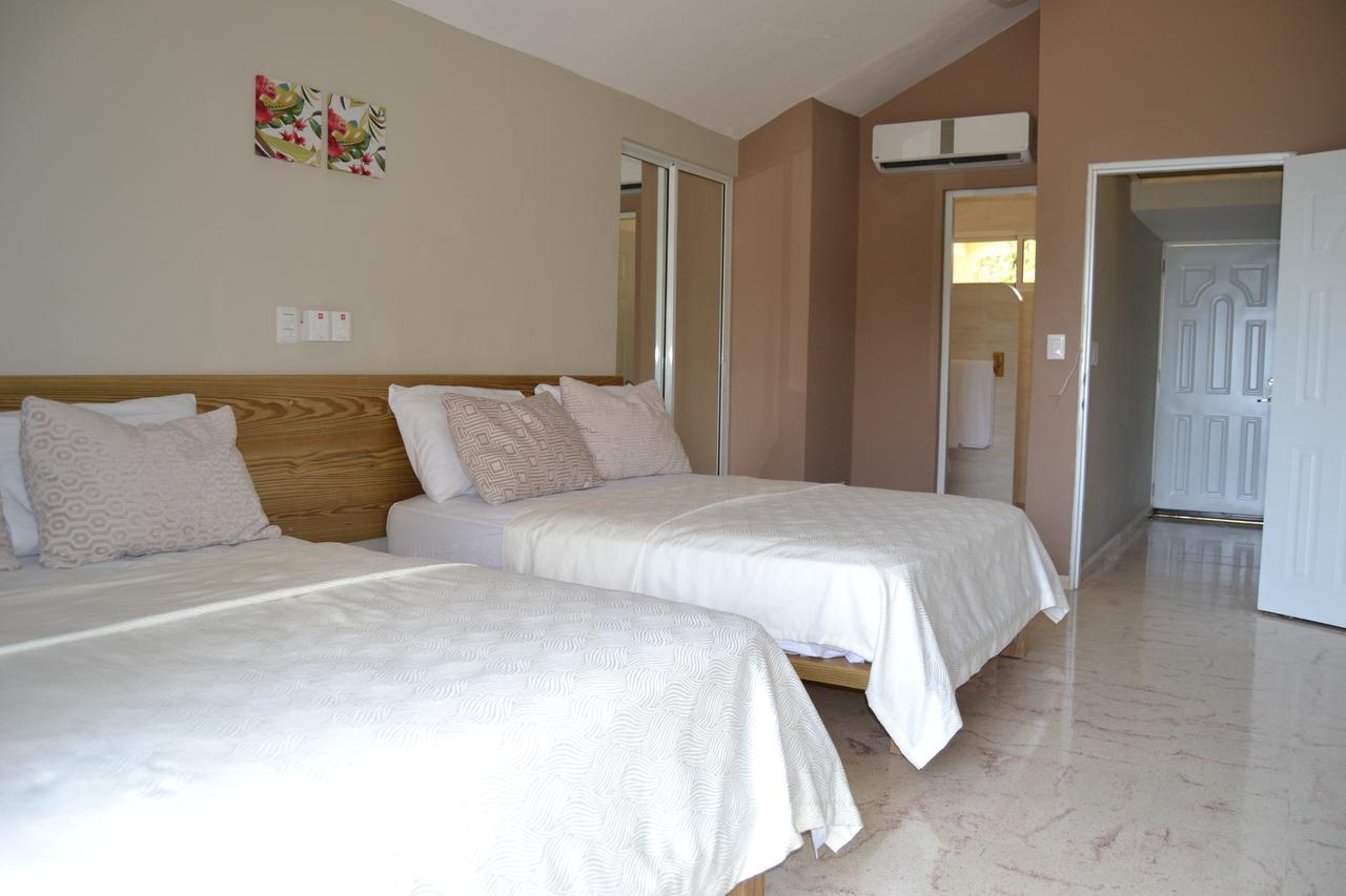 Paradise Island Beach Resort Punta Rucia Pokoj fotografie